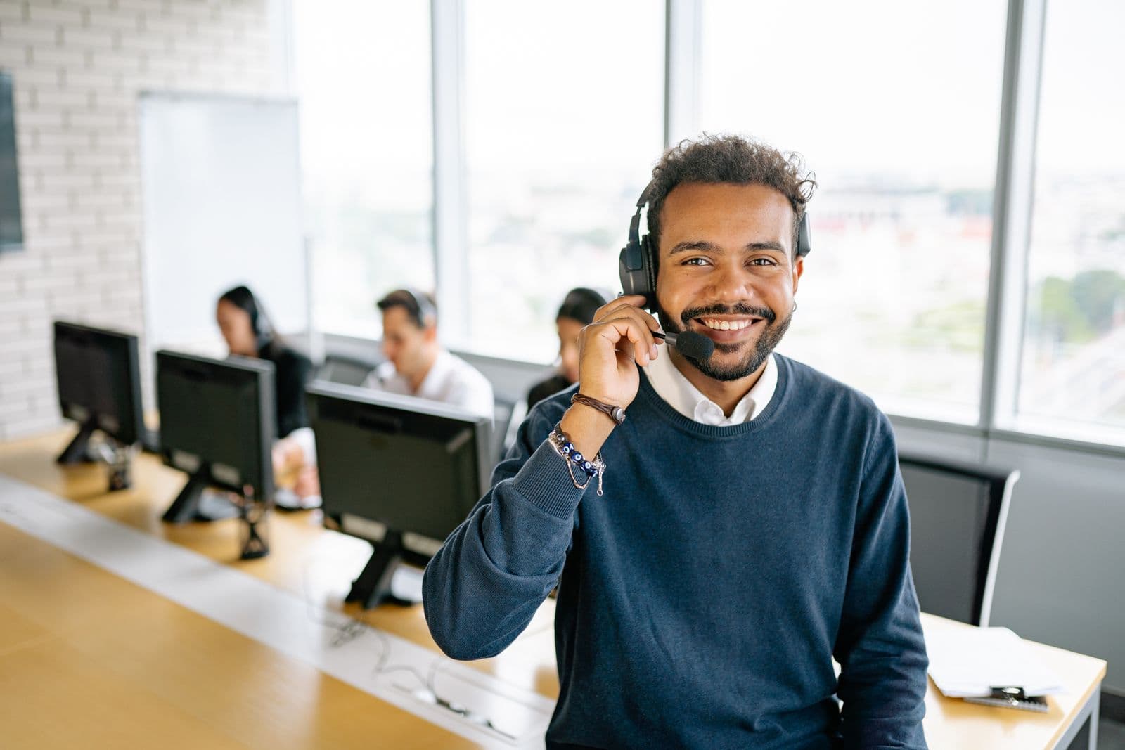 A friendly licensed advisor taking a call
